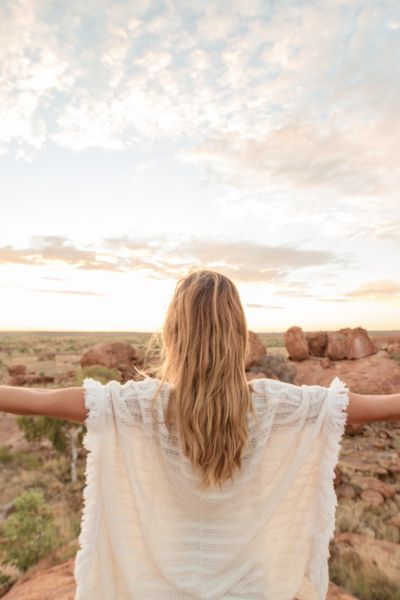 woman with arms wide open